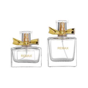 Quality Luxury 50ml Glass Perfume Bottle 10000pcs With Gold Bow Cap wholesale