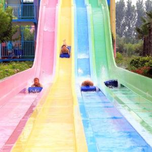 Quality Family Friendly Rainbow Water Slide Aquatic Slide For Recreation Park wholesale