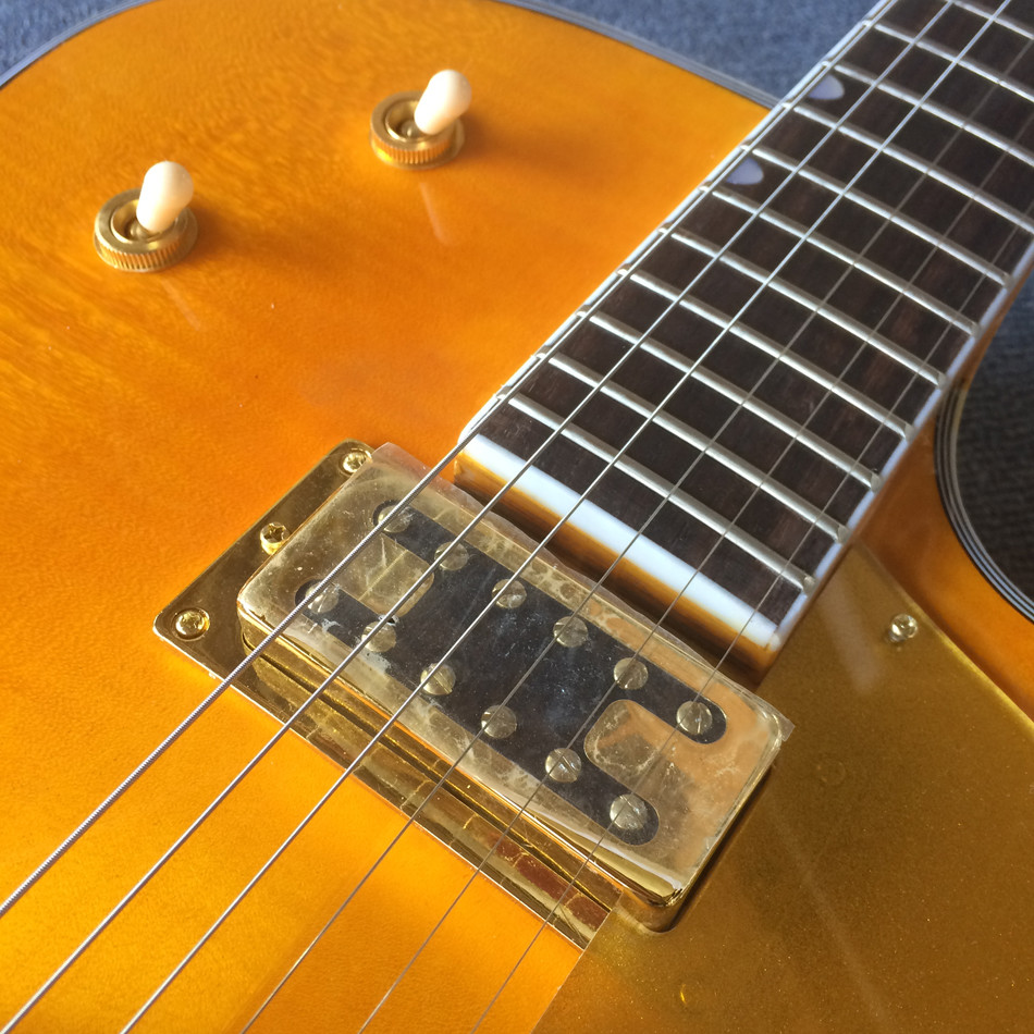 New style high-quality hollow body jazz electric guitar, Double F holes,Tremolo system ,Flame Maple top