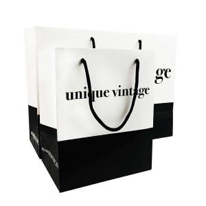 Quality OEM Customized Designs Luxury Matte Gift Shopping Paper Bag With Logo For Clothing Shoes wholesale
