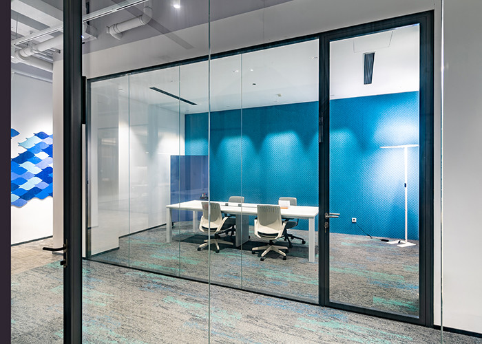 Glass Partition Walls: Elevating Modern Workspaces Through Design & Wellbeing