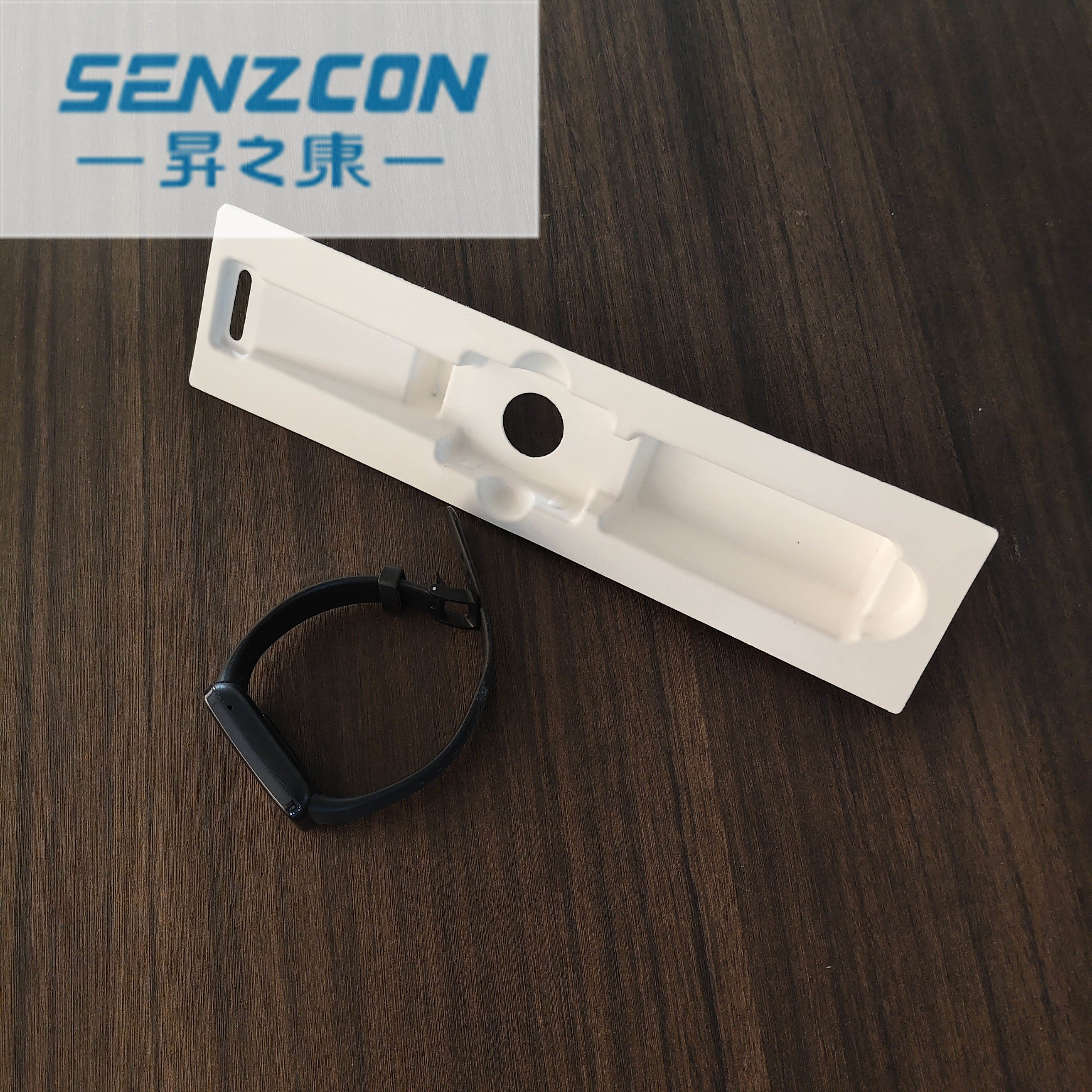 The pulp molding factory directly supplies the packaging for electronic watches. It has an embedded base that prevents falling and provides shock