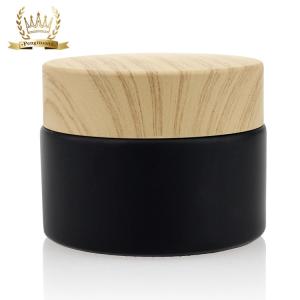 Quality 50g Cosmetic Packaging Set Bamboo Screw Cap Black Matte Glass Jars wholesale
