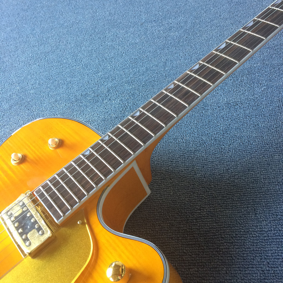 New style high-quality hollow body jazz electric guitar, Double F holes,Tremolo system ,Flame Maple top