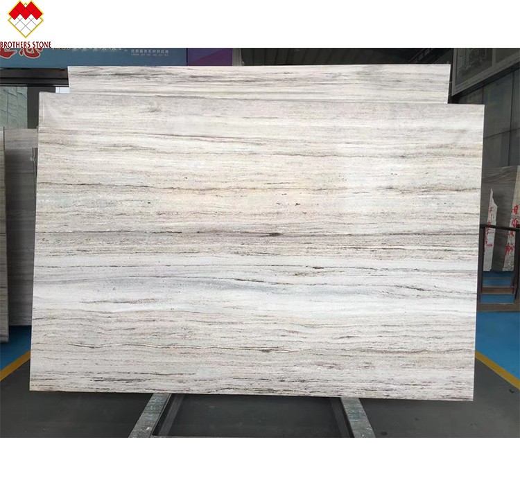 White Wood Look Marble Tiles Stair Follow Veins for a Versatile and Timeless Design