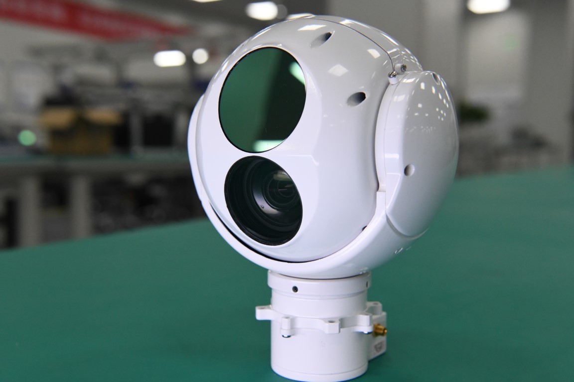 Dual Sensor Electro Optical Tracking UAV Payload Over 15km Detection