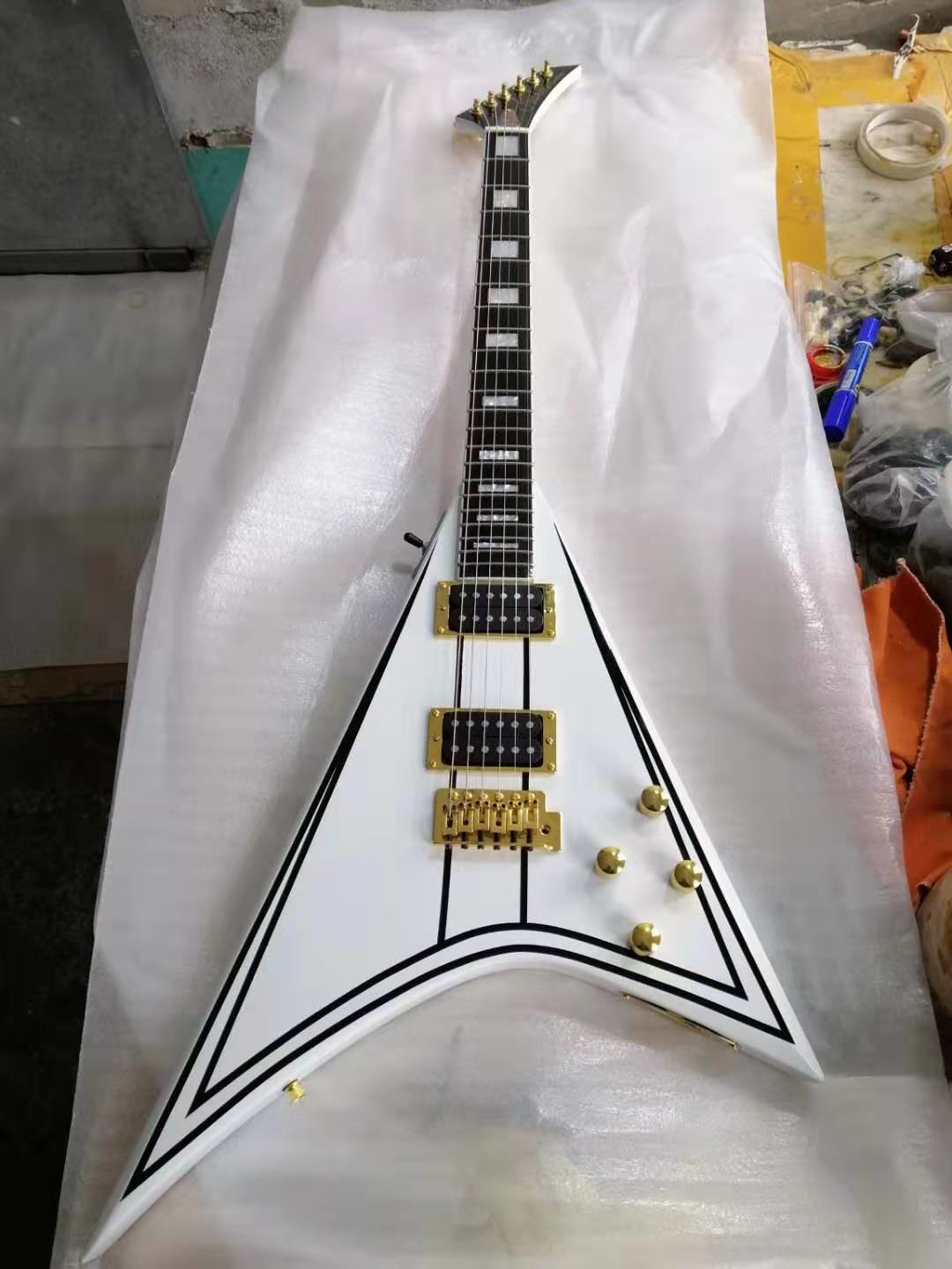 V shape 6 string electric guitar, white body, gold hardware, Fingerboard ebony, free shipping