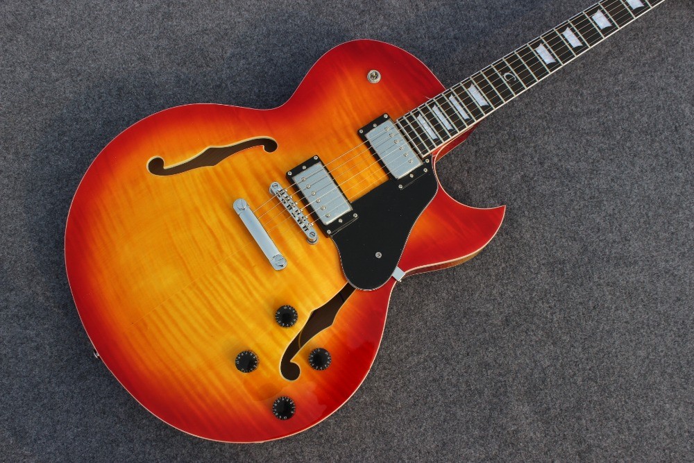 Hollow body ES137 jazz guitar with cherry burst color and chrome hardware