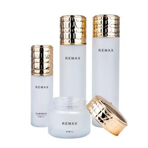 Quality 50g/40ml/100ml/120ml white Frosted Glass cylindrical bottle with Golden Lid for cosmetic packaging bottle wholesale