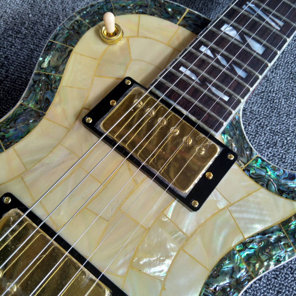 New arrival shell electric guitar with 6 strings guitar and gold pickups