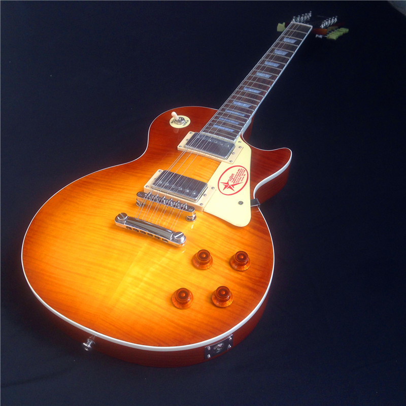 Standard LP electric guitar with gold hardware and flower inlay