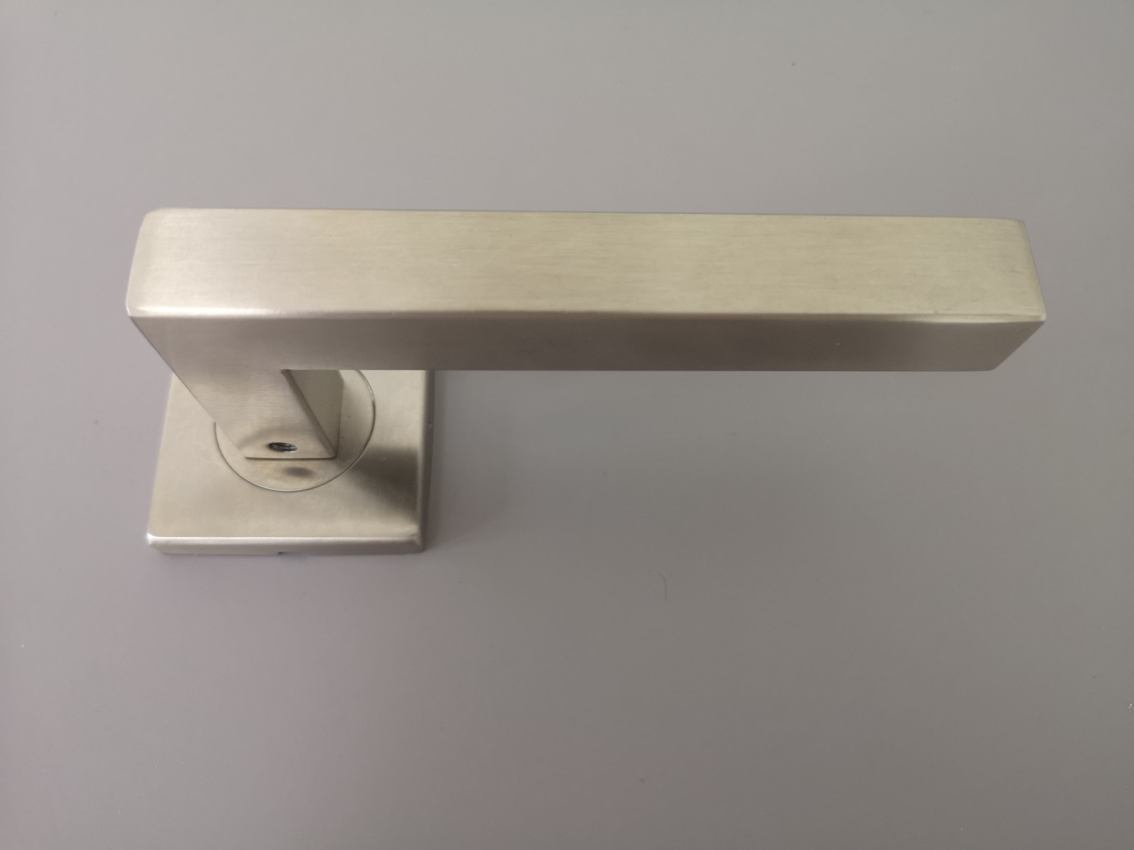 Stainless Steel Rectangular Lever Handle On Square Rose
