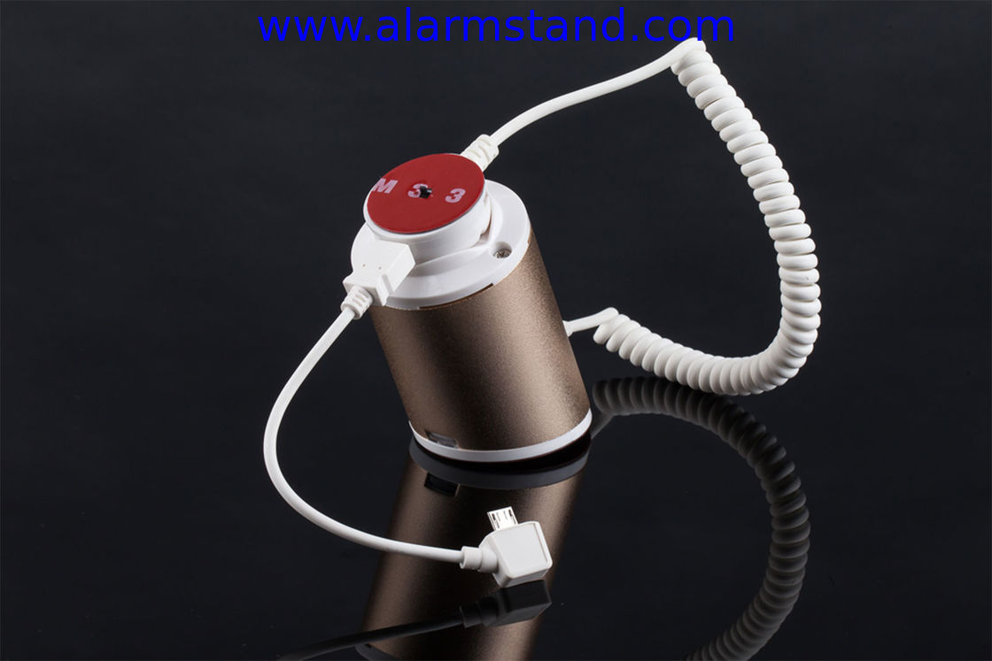 COMER High quality Rotating display stand for phone with charging cable and alarm sensor