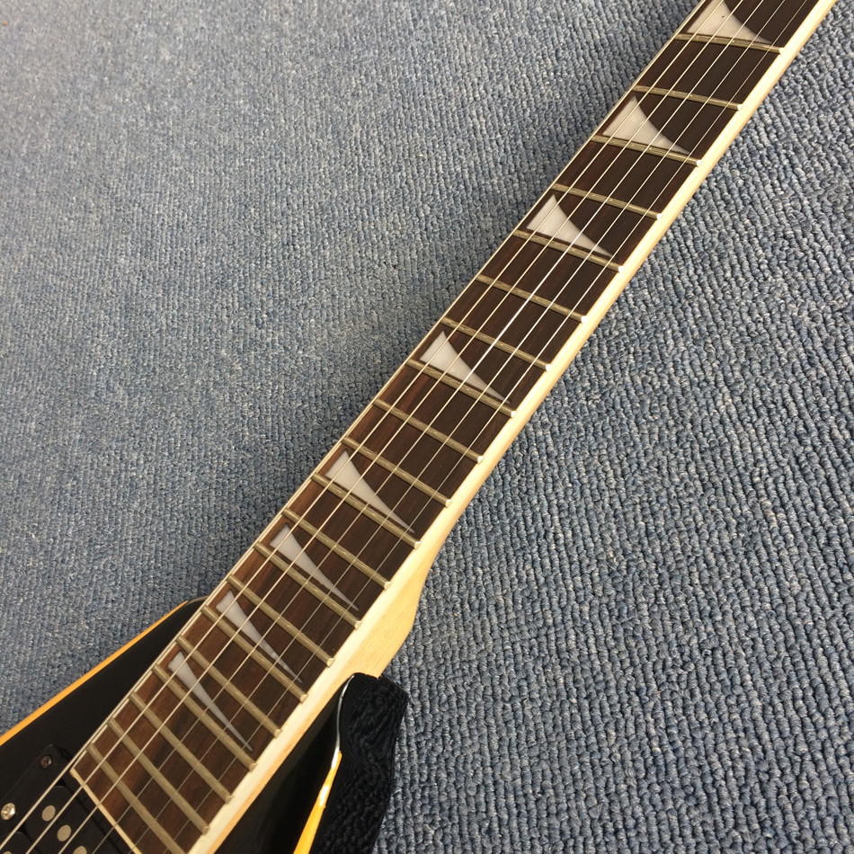 New high quality V type electric guitar,Rosewood, yellow circle black edge
