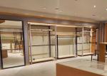 Graceful Wooden And Steel Clothes Display Stand / Retail Clothing Store Fixtures