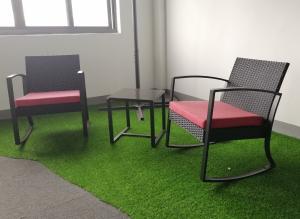 Quality Plastic Steel Frame Garden Rattan Rocking Sofa Coffee Table Set wholesale