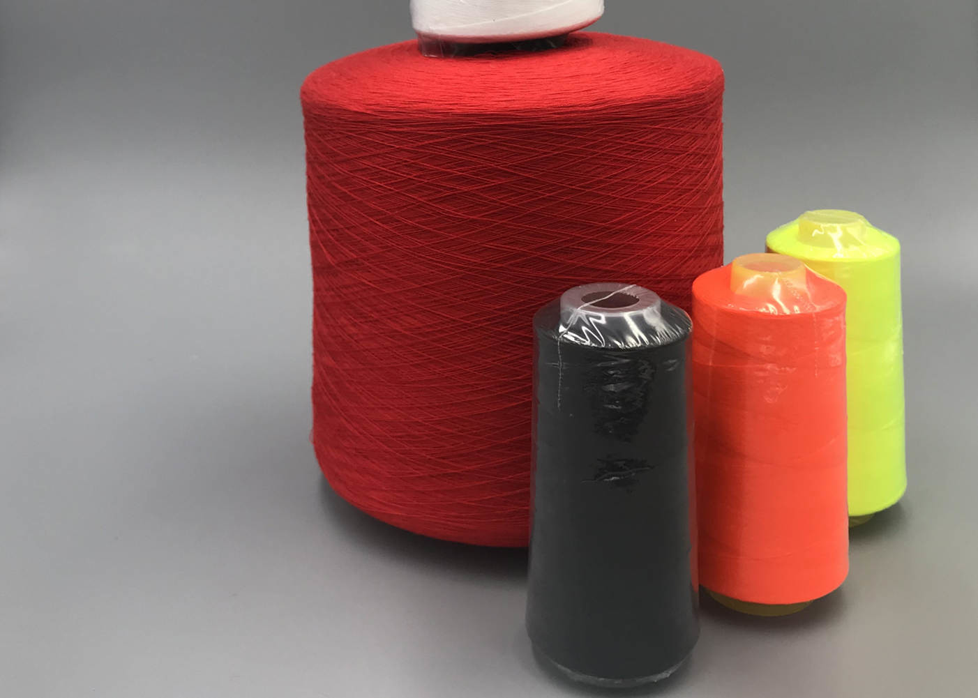Bright 60/3 High Quality Dyed Spun Polyester Yarn For Sewing