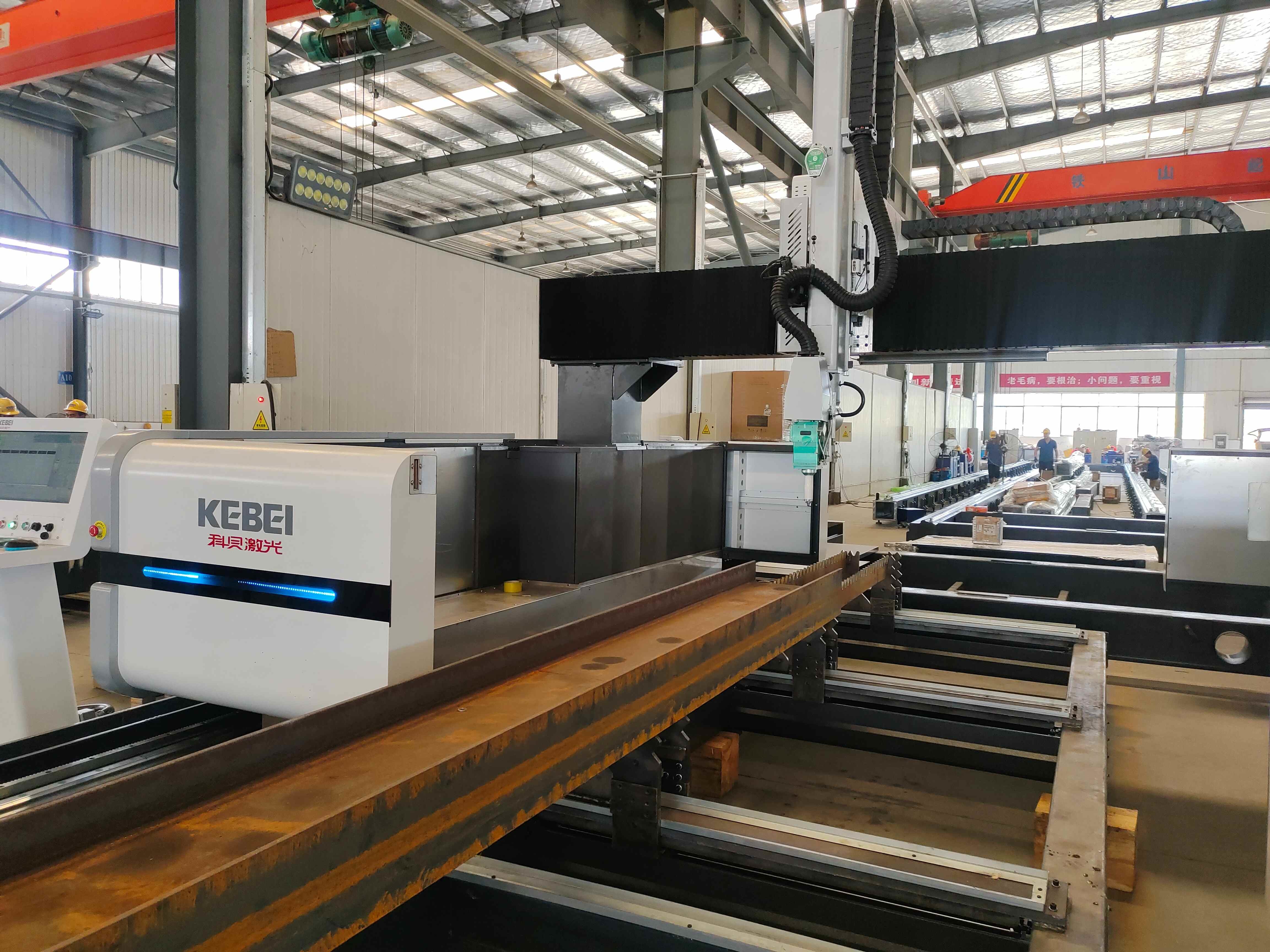 Experience fast and accurate cutting with Laser head Ec-Ophit fiber laser cutting machine at 0-30m/min