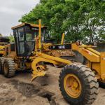 Used excavator land leveller Caterpillar CAT140K roader machine secondhand japan