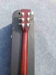 2018 Orange Sunburst Dovo acoustic guitar