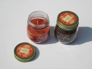 Quality Orange &amp; Brown scented round glass jar candle with printed label decor wholesale