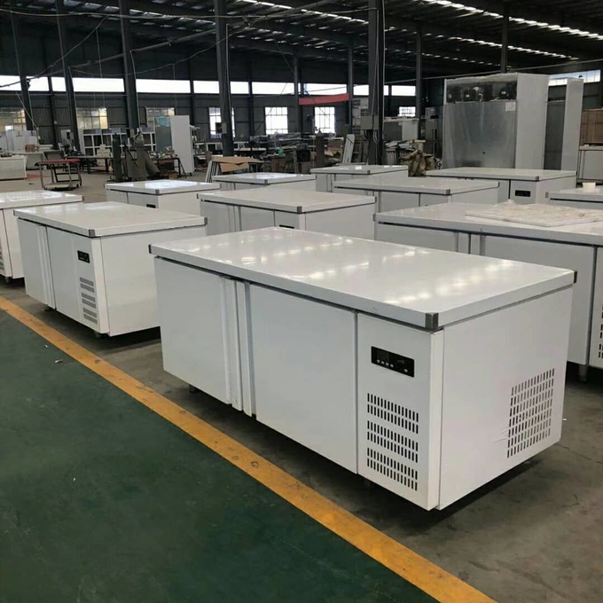 Stainless steel commercial refrigerator workbench in the back kitchen of hotel restaurant 1