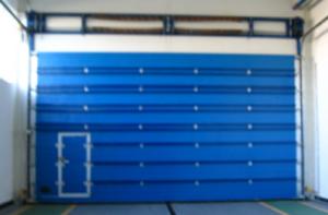 China Blue Color Electric Sectional Garage Doors Coated Photoelectric Sensors on sale