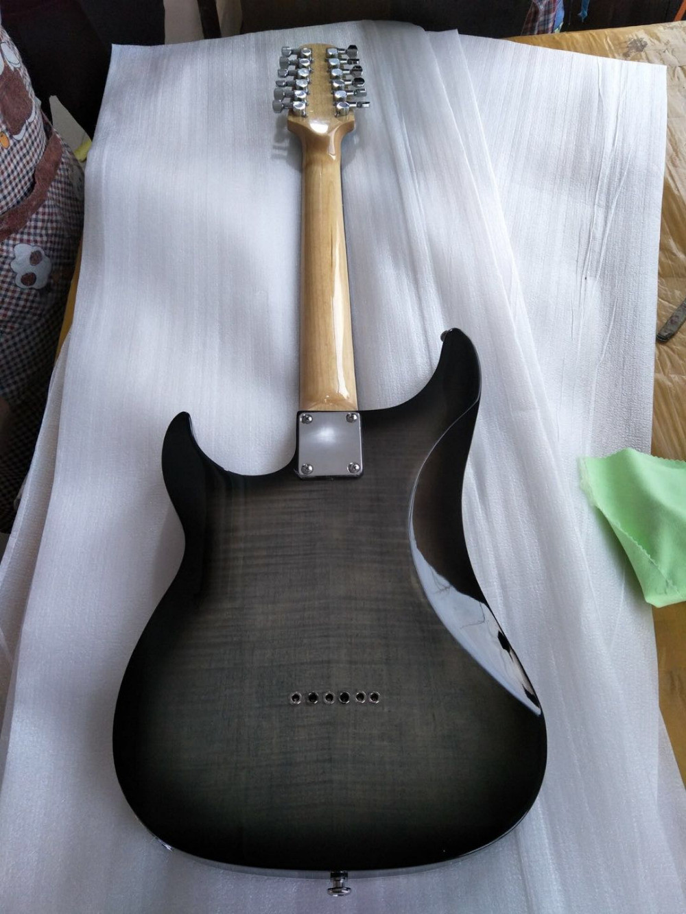 New arrival 6 string electric guitar with silvery bridge and cool shape