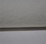 Warp knitted and polar fleece composite fabric