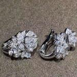 Piaget brand jewelry 18kt Piaget Rose earrings in 18K white gold set with 72