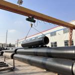 POLYETHYLENE INSULATED PIPE EXTRUSION LINE, UTILIZING VACUUM CALIBRATION