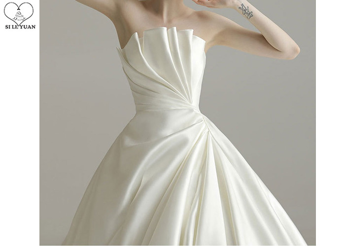 Cream luxury Unique Ball Gown Wedding Dresses Satin Long Tail Big Pleats