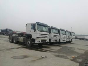 Quality China low price sinoruk HOWO 6*4 right hand drive haulage truck head 371hp HOWO prime mover tractor truck for sale wholesale