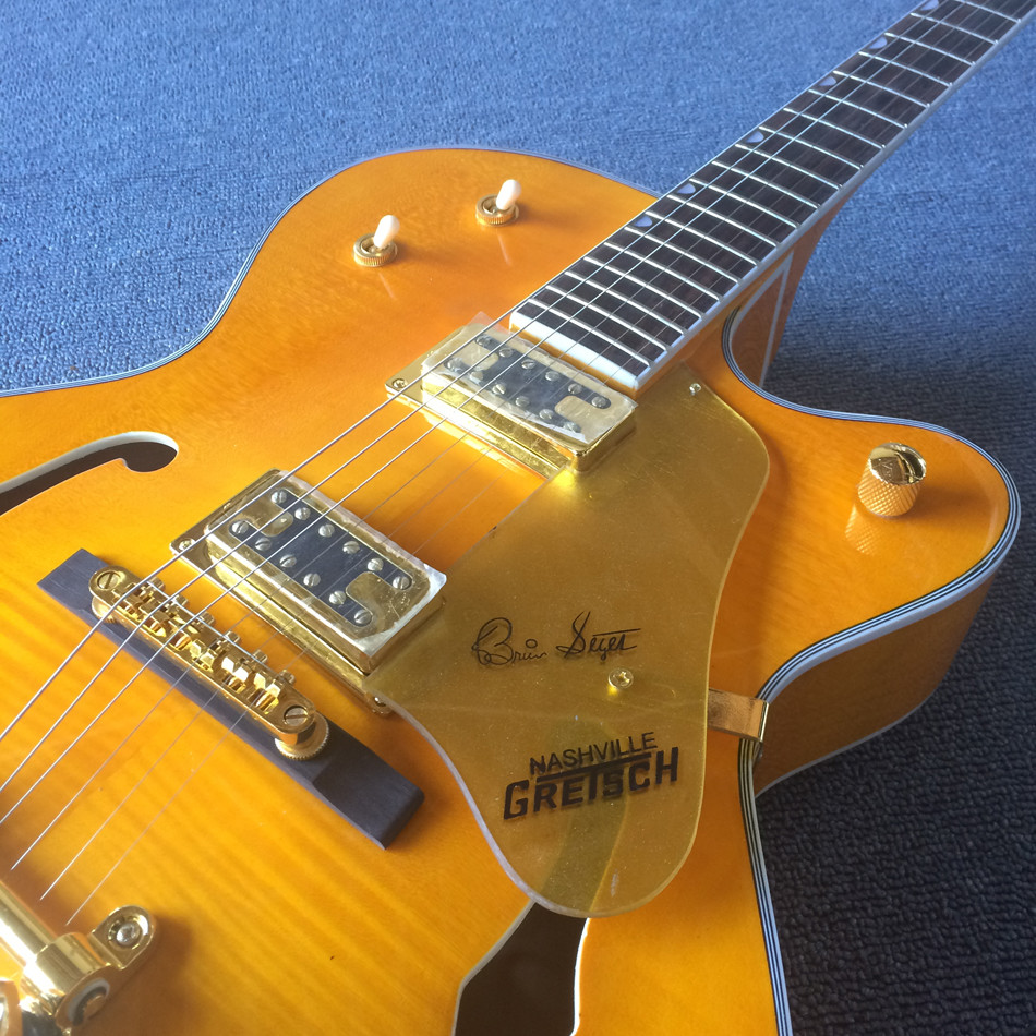 New style high-quality hollow body jazz electric guitar, Double F holes,Tremolo system ,Flame Maple top