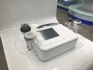 Quality 4 in1 rf 40K hz Cavitation Slimming machine vacuum rf roller+tripolar rf+cavitation Machine wholesale
