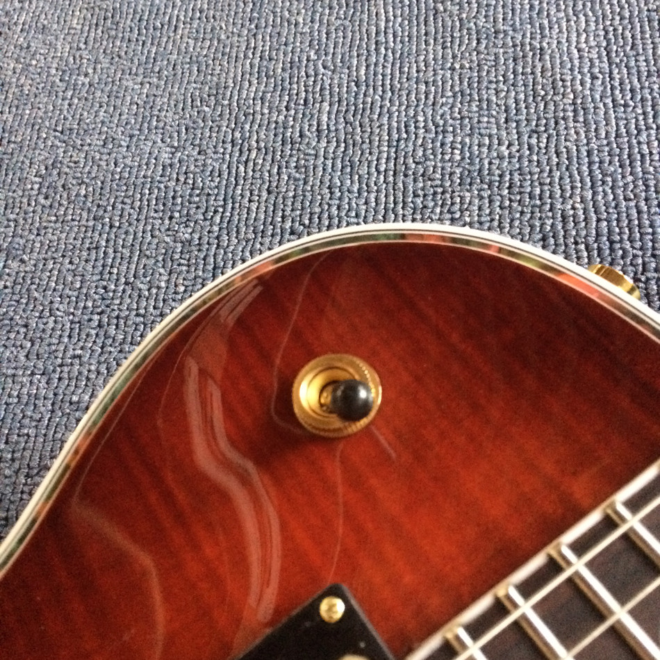 A new style of custom guitar, double F holes,Gold hardware,Flame Maple Top & Back