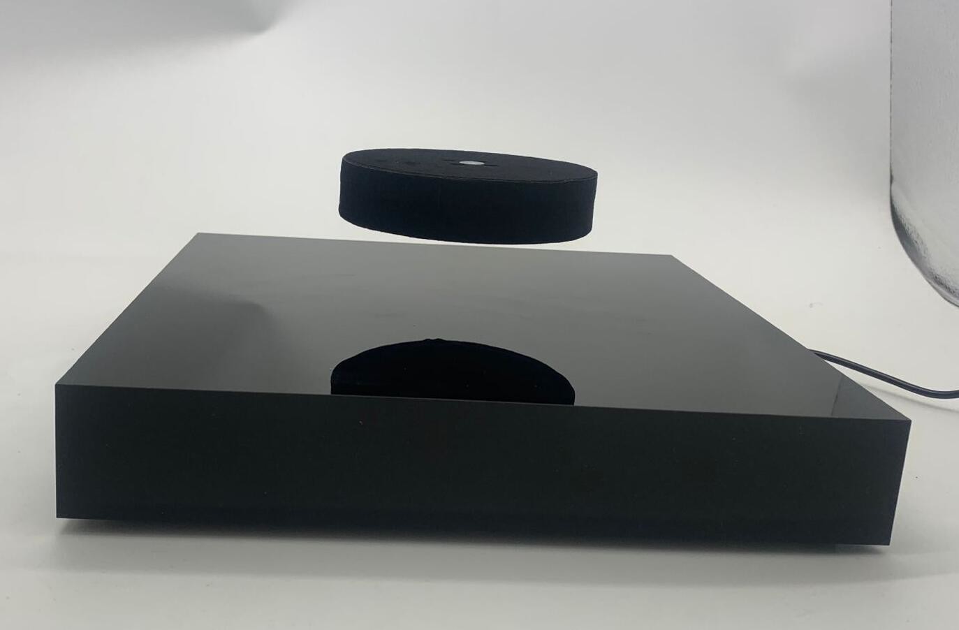 wireless charging rechargeable levitation floating bottle display stand with inducation tray