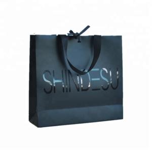 Quality Customized Logo Printed Paper Merchandise Bags Luxury High Bearing Capacity wholesale