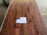 different stained Asian Teak solid hardwood flooring with distressed finishing