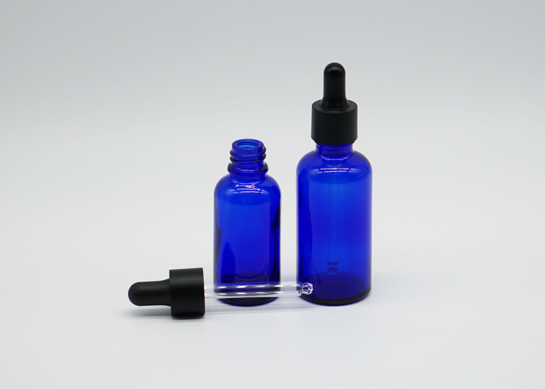 Cylinder Essential Oil Dropper Bottles Lotion Pump Tops Blue Clear Color