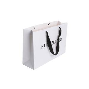Quality Ribbon Handle Ivory Board Paper Bags With Custom Logo For Handmade Clothing Packaging wholesale