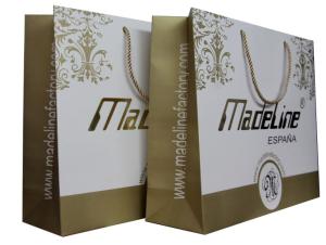 Quality Gold White Paper Carrier Bag Of Made Line Lady Fashion Collection Twist Handle Embossed Logo wholesale