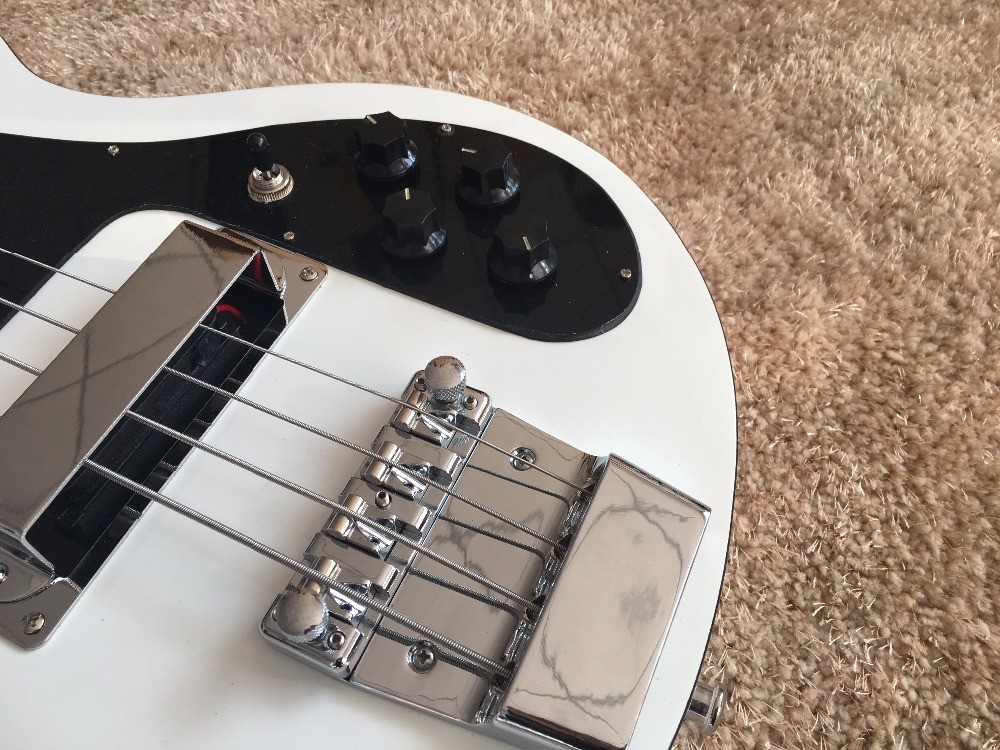 4 string bass guitar set in neckshark inlay on rosewood black ABS binding set in neck RIC 4003 bass guitar