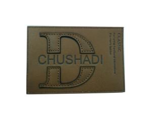 Quality Lead Free Finish Brown Embossed Leather Patches / Labels For Garment Accessories wholesale