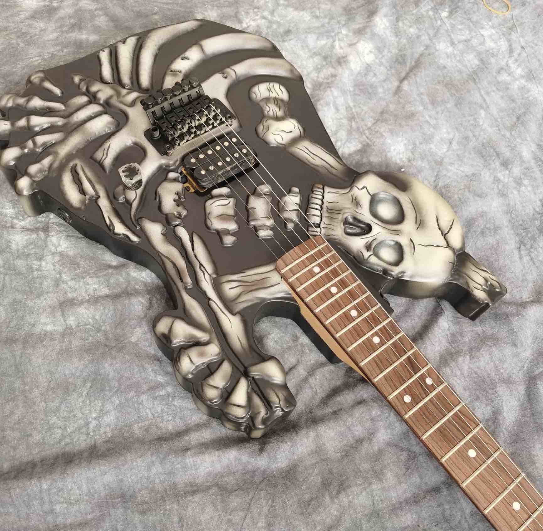 Skull Carving Body 6 Strings Electric Guitar in Matte Black Color