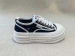 Women black and white sneakers with breathable mesh and mid top