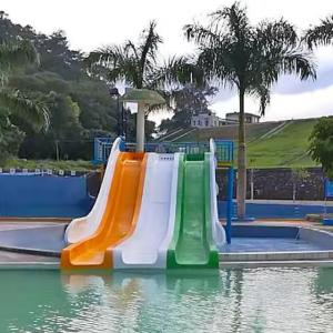 Quality Family Friendly Straight Rainbow Kids Water Slide Colourful Fiberglass wholesale