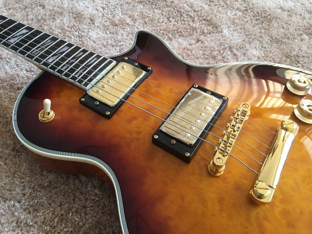 LP custom guitar tobacco sunburst quilted maple body Back contour and neck joint contour Ebony fingerboard custom guitar
