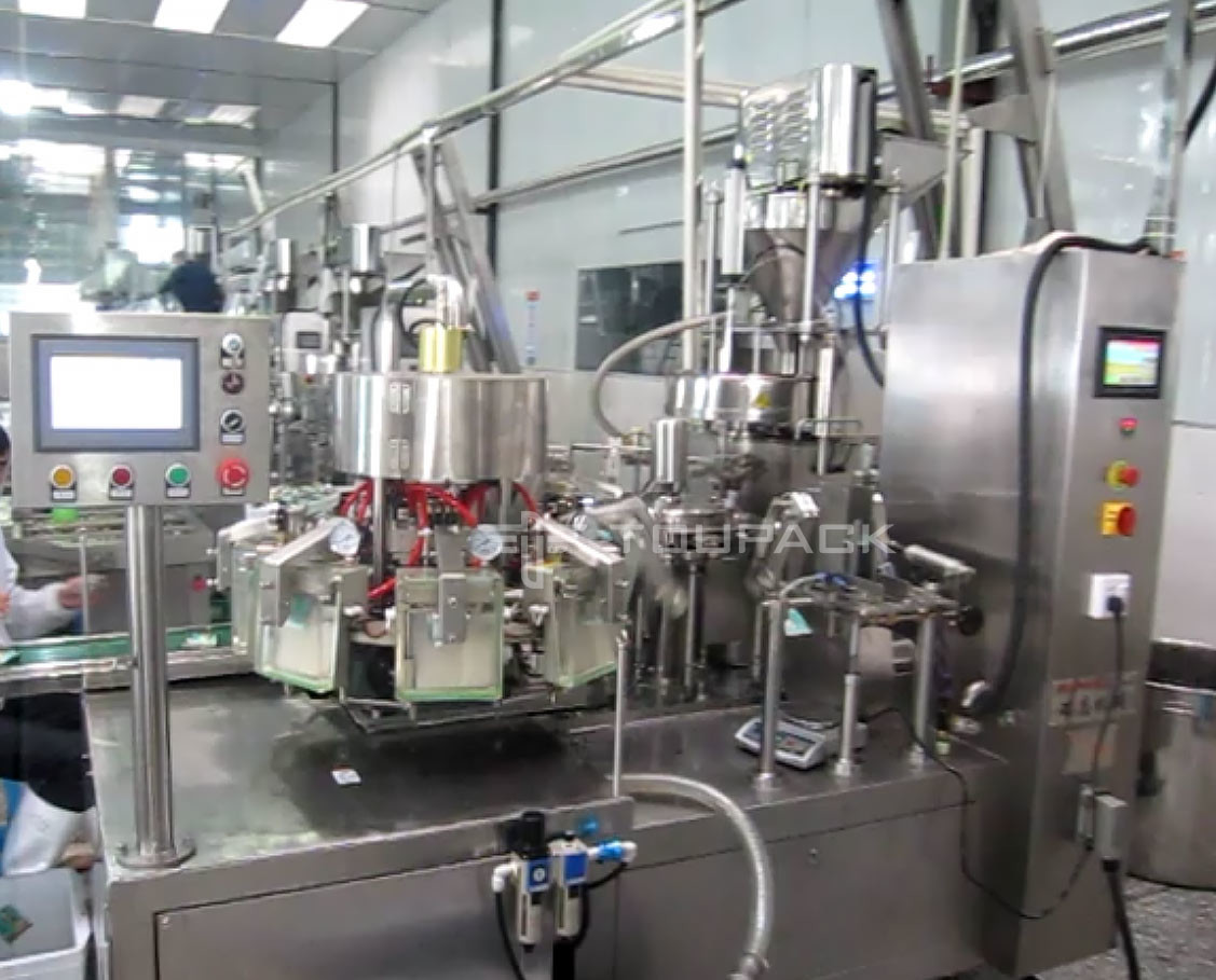 SS304 Automatic Rotary Vacuum Filling And Packing Machine Feeding Packing Equipment