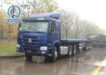 3 Axles New Loading Construction Machines Hydraulic Flatbed Semi Trailer 70 Tons